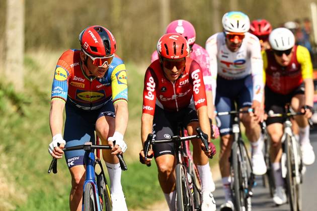 Danish Mads Pedersen of Lidl-Trek and Belgian Arjen Livyns of Lotto Cycling Team pictured in action during the men elite Gent-Wevelgem - In Flanders Fields one day cycling race, 250.3 km from Ieper to Wevelgem, Sunday 30 March 2025. DAVIDxPINTENS x117217634x