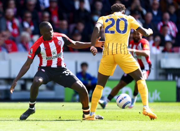 Brentford v Brighton and Hove Albionl, English Premier League, The Gtech Community Stadim, Football, London, UK - 19 Apr 2025 Carlos Baleba of Brighton and Hove Albion slips past Michael Kayode of Brentford London The Gtech Community Stadium London GBR, UK NEWSPAPERS OUT Copyright: xMarkxGreenwoodx