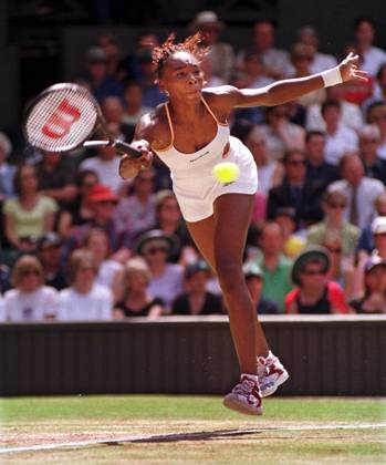 Venus Williams Wimbledon Tennis Championships 2000 Venus Williams playing Serena Williams at Wimbledon July 2000 Venus Williams during Womens singles match against her sister Serena Williams Copyright: xDavidxAshdownx DMGTCHPDPICT000349381814
