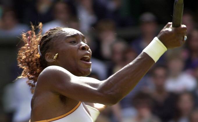 Venus Williams Wimbledon Tennis Championships 2000 Venus Williams playing Serena Williams at Wimbledon July 2000 Venus Williams during Womens singles match against her sister Serena Williams Copyright: xDavidxAshdownx DMGTCHPDPICT000404158289