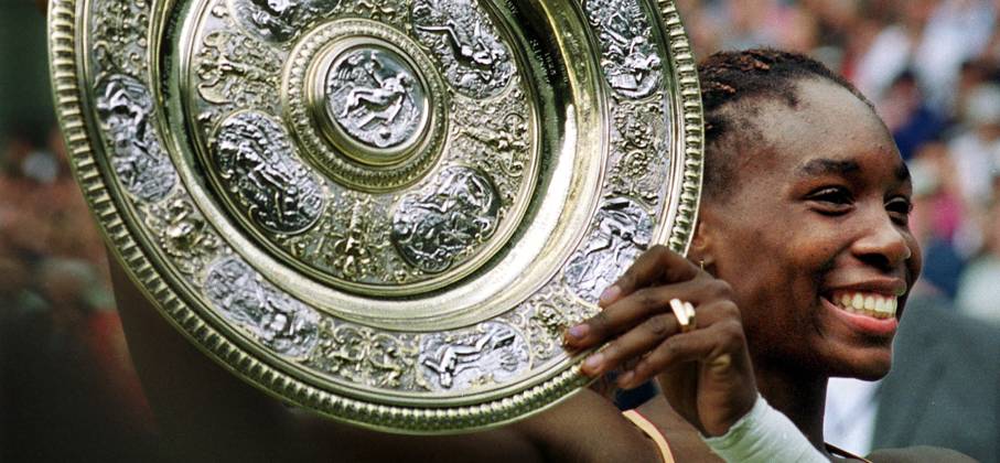 Venus Williams Wimbledon Tennis Championships 2000 Venus William with Women s Singles Trophy at Wimbledon July 2000 Venus Williams Tennis player of the US with trophy in Centre Court at Wimbledon after defeating compatriot Lindsay Davenport in the women s final Williams won the match 6-3 7-6. Copyright: xDavidxAshdownx DMGTCHPDPICT000353797929