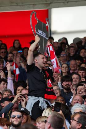 Football - 2024 2025 Premier League - Southampton vs Arsenal - St Mary™s Stadium - Sunday 25th May 2025 A Southampton fan with a mock champions league trophy with a 12 points COLORSPORT Shaun Boggust