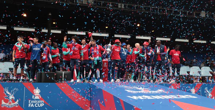 . - Crystal Palace FA Cup Trophy Parade & Celebrations, Selhurst Park Stadium, London, England. - 26th May 2025. (C) Daniel Weir Crystal Pix Joel Ward of Crystal Palace & Marc Guehi of Crystal Palace hold aloft the Emirates FA Cup Trophy in celebration with there team mates on the stage at Selhurst Park under Confetti during the Crystal Palace FA Cup trophy bus parade & party celebrations at Selhurst Park stadium in South London. - Crystal Palace FA Cup Trophy Parade & Celebrations, Selhurst Park Stadium, London, England. - 26th May 2025. (C) Daniel Weir Crystal Pix London Selhurst Park Stadium United Kingdom Copyright: xDanielxWeirx CP_Crystal_Palace_Bus_Parade_Party_07