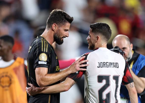 Orlando, USA, 24th June 2025. Oliver Giroud of Los Angeles FC with former teammate Jorginho of CR Flamengo during the Los Angeles FC vs CR Flamengo FIFA Club World Cup match at Camping World Stadium, Orlando. Picture credit should read: David Klein Sportimage EDITORIAL USE ONLY. No use with unauthorised audio, video, data, fixture lists, club league logos or live services. Online in-match use limited to 120 images, no video emulation. No use in betting, games or single club league player publications. SPI_030_DK_LA_FC_Flamengo SPI-3991-0030