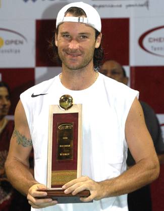 Jan 09, 2005; Madras, INDIA; CARLOS MOYA of Spain holds his trophy after winning the ATP, Tennis Herren Tour Chennai Open tennis championship at the south Indian city of Madras on January 09, 2005. The world number five tennis player beated Thai star Paradorn Srichaphan 3-6, 6-4, 7-6 (7-5) in the final match. Moya donated his entire 8,770 prize money to relief efforts for the December 26 tsunami-earthquake catastrophe that killed more than 150,000 in Asia. Madras INDIA Copyright: xTCxMalhotrax