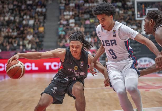 July 6, 2025, Lausanne, Vaud, Switzerland: Lausanne Switzerland, 07 06 2025: KEENAN GARMER of Germany 13 against MIKEL BROWN. JR of USA 9 during final of FIBA U19 Basketball World Cup 2025 and took place at Lausanne Arena in Lausanne..USA won 109-76. Lausanne Switzerland - ZUMAd206 20250706_zip_d206_009 Copyright: xEricxDubostx