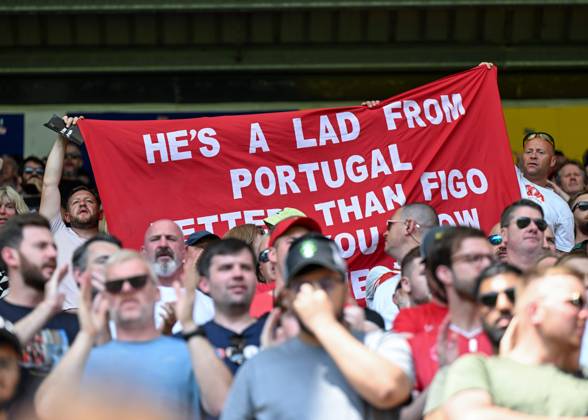 Preston, England, 13th July 2025. Liverpool fans holding a banner in tribute of Liverpool player Diogo Jota ahead of the Preston North End vs Liverpool Pre Season Friendly match at Deepdale, Preston. Picture credit should read: Cody Froggatt Sportimage EDITORIAL USE ONLY. No use with unauthorised audio, video, data, fixture lists, club league logos or live services. Online in-match use limited to 120 images, no video emulation. No use in betting, games or single club league player publications. SPI_022_CF_PRESTON_V_LIVERPOOL SPI-4018-0024