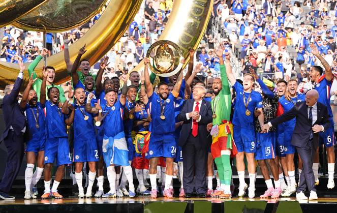 Football: Club World Cup Chelsea players celebrate, as U.S. President Donald Trump (C, R) looks on, after beating Paris Saint-Germain in the Club World Cup final at MetLife Stadium in East Rutherford, New Jersey, on July 13, 2025.  A14AA0004722124P