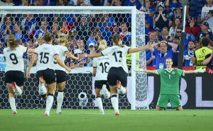 Ann-Katrin Berger 7 goalkeeper of Team Germany catches the desicive 11m and celebrate with team mates in the football quarter-final UEFA Women EURO 2025 match FRANCE - GERMANY in Season 2025 2026 at July 19, 2025 in St. Jakob-Park Basel , Switzerland.