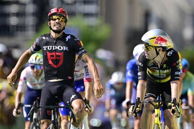 French Julian Alaphilippe of Tudor Pro Cycling Team, Belgian Wout van Aert of Team Visma-Lease a Bike and pictured crossing the finish line of the stage 15 of the 2025 Tour de France cycling race, from Muret to Carcasonne (169 km), on Sunday 20 July 2025 in France. The 112th edition of the Tour de France starts on Saturday 5 July in Lille, France, and will finish in Paris, France on the 27th of July. DIRKxWAEM x129658593x