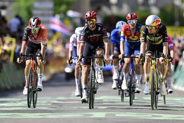 French Julian Alaphilippe of Tudor Pro Cycling Team, Belgian Wout van Aert of Team Visma-Lease a Bike and pictured crossing the finish line of the stage 15 of the 2025 Tour de France cycling race, from Muret to Carcasonne (169 km), on Sunday 20 July 2025 in France. The 112th edition of the Tour de France starts on Saturday 5 July in Lille, France, and will finish in Paris, France on the 27th of July. DIRKxWAEM x129658614x