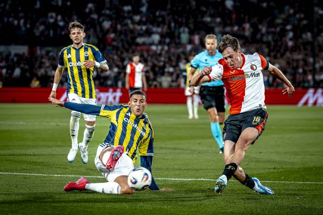 Fenerbahce SK defender Mert Muldur, Feyenoord Rotterdam forwarder Leo Sauer during the match Feyenoord - Fenerbahce at the Kuip Stadium for the third qualifying round champions league season 2025-2026 in Rotterdam, Netherlands on 6 august 2025, (photo by Marcel van Dorst EYE4images DeFodi Images)
