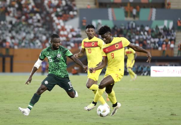 Nigeria v Angola - Africa Cup of Nations ABIDJAN, IVORY COAST - FEBRUARY 02: Paul Onuachu (L) of Nigeria in action against Zini (R) of Angola during the Africa Cup of Nations quarterfinal match between Nigeria and Angola at Felix Houphouet Boigny Stadium in Abidjan, Ivory Coast on February 02, 2024. Côte d Ivoire World. Editorial use only. Please get in touch for any other usage. Copyright: x2025xAnadoluxYvanxGabonx