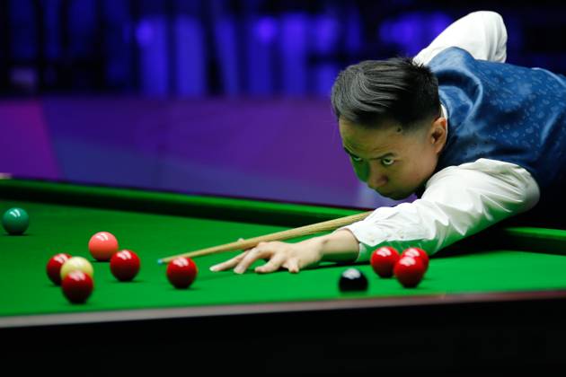 WUHAN, CHINA - AUGUST 24: Xiao Guodong of China plays a shot in the first round match against Mink Nutcharut of Thailand on day 1 of the 2025 Wuhan Open Qualifiers at Optics Valley Gymnasium of HUST on August 24, 2025 in Wuhan, Hubei Province of China. Copyright: xTaixChengzhex 111586616981