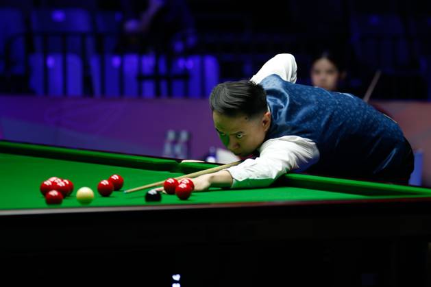 WUHAN, CHINA - AUGUST 24: Xiao Guodong of China plays a shot in the first round match against Mink Nutcharut of Thailand on day 1 of the 2025 Wuhan Open Qualifiers at Optics Valley Gymnasium of HUST on August 24, 2025 in Wuhan, Hubei Province of China. Copyright: xTaixChengzhex 111586616979