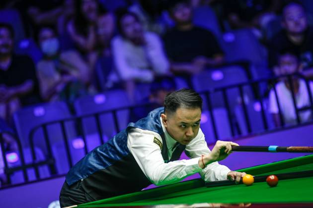 WUHAN, CHINA - AUGUST 24: Xiao Guodong of China plays a shot in the first round match against Mink Nutcharut of Thailand on day 1 of the 2025 Wuhan Open Qualifiers at Optics Valley Gymnasium of HUST on August 24, 2025 in Wuhan, Hubei Province of China. Copyright: xTaixChengzhex 111586616985