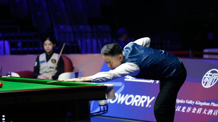 WUHAN, CHINA - AUGUST 24: Xiao Guodong of China plays a shot in the first round match against Mink Nutcharut of Thailand on day 1 of the 2025 Wuhan Open Qualifiers at Optics Valley Gymnasium of HUST on August 24, 2025 in Wuhan, Hubei Province of China. Copyright: xTaixChengzhex 111586616978