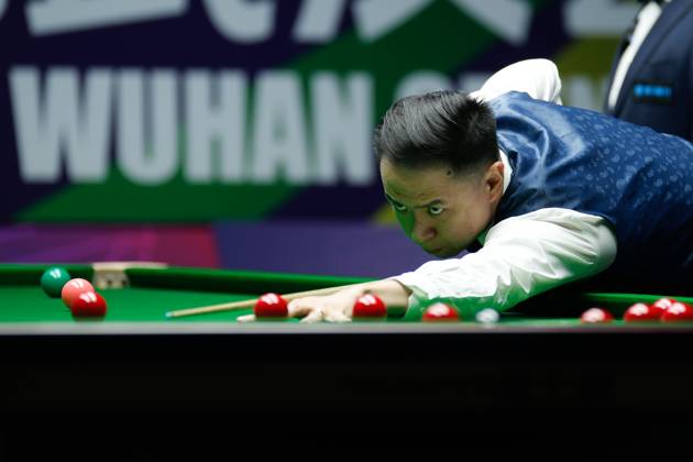 WUHAN, CHINA - AUGUST 28: Xiao Guodong of China plays a shot in the Quarterfinal match against Stan Moody of England on day 5 of the 2025 Wuhan Open at Optics Valley Gymnasium of HUST on August 28, 2025 in Wuhan, Hubei Province of China. Copyright: xTaixChengzhex 111587441741