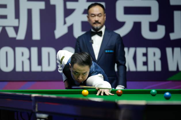 WUHAN, CHINA - AUGUST 28: Xiao Guodong of China plays a shot in the Quarterfinal match against Stan Moody of England on day 5 of the 2025 Wuhan Open at Optics Valley Gymnasium of HUST on August 28, 2025 in Wuhan, Hubei Province of China. Copyright: xTaixChengzhex 111587441727