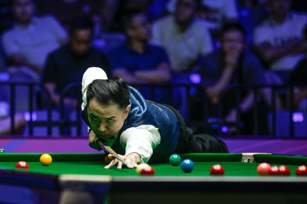 WUHAN, CHINA - AUGUST 29: Xiao Guodong of China plays a shot in the Semifinal match against Mark J Williams of Wales on day 6 of the 2025 Wuhan Open at Optics Valley Gymnasium of HUST on August 29, 2025 in Wuhan, Hubei Province of China. Copyright: xTaixChengzhex 111587654949