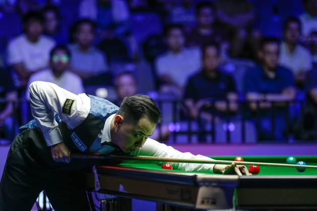 WUHAN, CHINA - AUGUST 29: Xiao Guodong of China plays a shot in the Semifinal match against Mark J Williams of Wales on day 6 of the 2025 Wuhan Open at Optics Valley Gymnasium of HUST on August 29, 2025 in Wuhan, Hubei Province of China. Copyright: xTaixChengzhex 111587654950