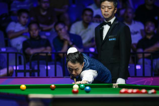 WUHAN, CHINA - AUGUST 29: Xiao Guodong of China plays a shot in the Semifinal match against Mark J Williams of Wales on day 6 of the 2025 Wuhan Open at Optics Valley Gymnasium of HUST on August 29, 2025 in Wuhan, Hubei Province of China. Copyright: xTaixChengzhex 111587654940