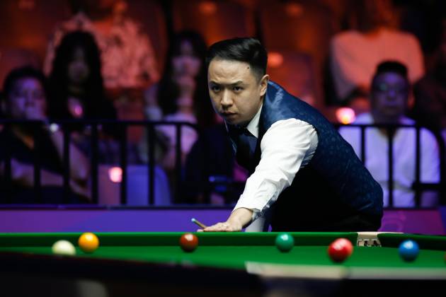 WUHAN, CHINA - AUGUST 30: Xiao Guodong of China plays a shot in the Final match against Gary Wilson of England on day 7 of the 2025 Wuhan Open at Optics Valley Gymnasium of HUST on August 30, 2025 in Wuhan, Hubei Province of China. Copyright: xTaixChengzhex 111587811803