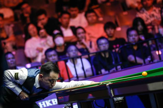 WUHAN, CHINA - AUGUST 30: Xiao Guodong of China plays a shot in the Final match against Gary Wilson of England on day 7 of the 2025 Wuhan Open at Optics Valley Gymnasium of HUST on August 30, 2025 in Wuhan, Hubei Province of China. Copyright: xTaixChengzhex 111587811805