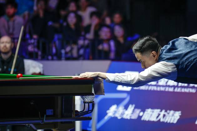 WUHAN, CHINA - AUGUST 30: Xiao Guodong of China plays a shot in the Final match against Gary Wilson of England on day 7 of the 2025 Wuhan Open at Optics Valley Gymnasium of HUST on August 30, 2025 in Wuhan, Hubei Province of China. Copyright: xTaixChengzhex 111587868020