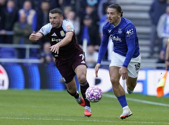 Liverpool, England, 13th September 2025. Jack Grealish of Everton (R) is challenged by John McGinn of Aston Villa during the Everton vs Aston Villa Premier League match at Hill Dickinson Stadium, Liverpool. Picture credit should read: Andrew Yates Sportimage EDITORIAL USE ONLY. No use with unauthorised audio, video, data, fixture lists, club league logos or live services. Online in-match use limited to 120 images, no video emulation. No use in betting, games or single club league player publications. SPI_025_AY_EVERTON_VILLA SPI-4134-0021