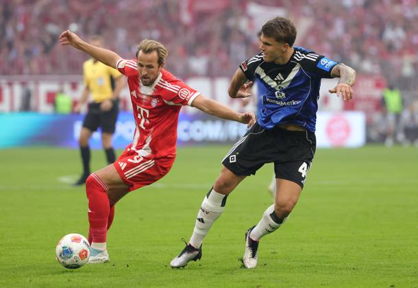(250914) -- MUNICH, Sept. 14, 2025 -- Harry Kane (L) of Bayern Munich vies with Luka Vuskovic of Hamburger SV during the German first division Bundesliga football match between Bayern Munich and Hamburger SV at Allianz Arena in Munich, Germany, Sept. 13, 2025. (Photo by Xinhua) (SP)GERMANY-MUNICH-FOOTBALL-BUNDESLIGA-BAYERN MUNICH VS HAMBURGER SV PhilippexRuiz 