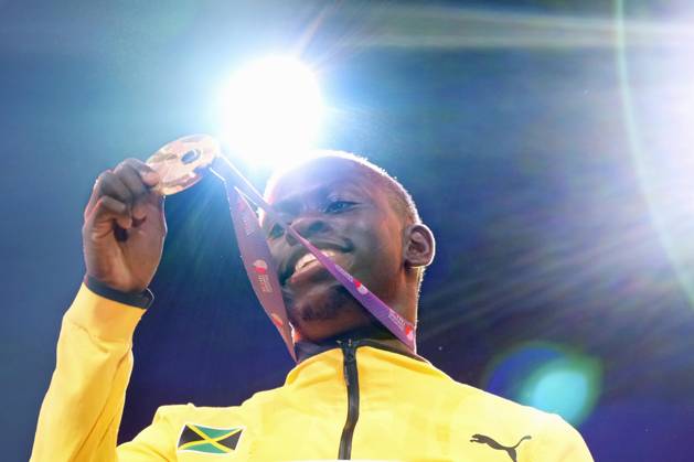 Athletics: World championships in Tokyo Gold medalist Oblique Seville of Jamaica poses on the podium during the medal ceremony for the men s 100-meter event at the World Athletics Championships at the National Stadium in Tokyo on Sept. 15, 2025.  A14AA0004851378P