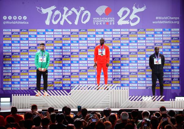 (250921) -- TOKYO, Sept. 21, 2025 -- Gold medalist Emmanuel Wanyonyi (C) of Kenya, silver medalist Djamel Sedjati (L) of Algeria and bronze medalist Marco Arop of Canada pose during the men s 800m awarding ceremony at the 2025 World Athletics Championships in Tokyo, Japan, Sept. 21, 2025. ) (SP)JAPAN-TOKYO-ATHLETICS-WORLD ATHLETICS CHAMPIONSHIPS-MEN S 800M-AWARDING CEREMONY JiaxHaocheng 