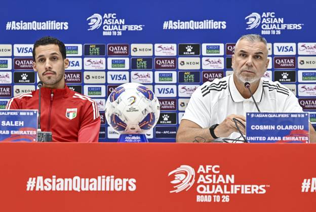 press conference, PK, Pressekonferenz TEAM UNITED ARAB EMIRATES-2026 FIFA World Cup, WM, Weltmeisterschaft, Fussball ASIAN QUALIFIER PLAYOFFS Head coach of United Arab Emirates Cosmin Olaroiu (R) and player Ali Saleh (L) attend a press conference ahead of the FIFA World Cup 2026 AFC Asian qualifiers playoffs group A match between Qatar and United Arab Emirates at Jassim Bin Hamad Stadium in Doha, Qatar, on October 13, 2025. DOHA Qatar Copyright: xNOUSHADx