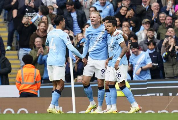 Manchester, England, 18th October 2025. Erling Haaland of Manchester City (C) celebrates after scoring the opening goal during the Manchester City vs Everton Premier League match at the Etihad Stadium, Manchester. Picture credit should read: Andrew Yates Sportimage EDITORIAL USE ONLY. No use with unauthorised audio, video, data, fixture lists, club league logos or live services. Online in-match use limited to 120 images, no video emulation. No use in betting, games or single club league player publications. SPI_020_AY_MAN_CITY_EVERTON SPI-4220-0020