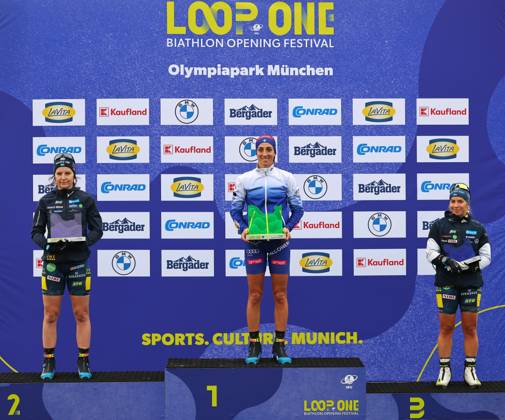BIATHLON - Loop One Opening Festival MUNICH,GERMANY,19.OCT.25 - BIATHLON - Loop One Opening Festival. Image shows the rejoicing of Johanna Skottheim (SWE), Lisa Vittozzi (ITA) and Anna Magnusson (SWE).  GEPAxpictures xThomasxBachun