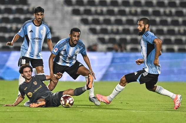 AL WAKRAH SC V AL RAYYAN SC-DOHA BANK STARS LEAGUE QATAR Almahdi Ali Mukhtar (C) of Al-Wakrah SC and Ahmed Alaaeildin Abdelmotaal (L) of Al Rayyan SC in action during the Doha Bank Stars League Qatar match between Al Wakrah SC and Al Rayyan SC at Saoud Bin Abdulrahman Stadium in Doha, Qatar, on October 26, 2025. DOHA Qatar Copyright: xNOUSHADx