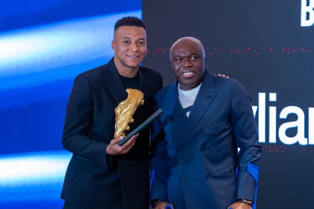 Real Madrid CF™s Kylian Mbappe (l) with his father Wilfried Mbappe during the ceremony of the Golden Boot 2024-25. October 31, 2025. (20251031267)