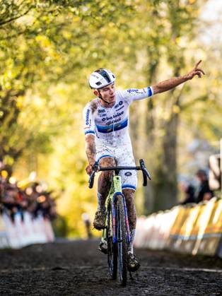 Belgian Thibau Nys celebrates as he crosses the finish line to win the men elite race of the Koppenbergcross, the first race (out of eight) of the X2O Badkamers trophy cyclocross competition, in Melden, Oudenaarde, on Saturday 01 November 2025. JASPERxJACOBS x138627996x