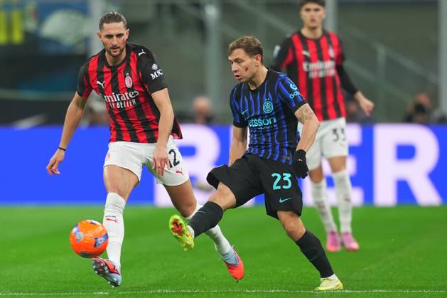 Inter Milan™s Nicolo Barella fights for the ball AC Milan s Adrien Rabiot during the Serie A soccer match between Inter and Milan at the San Siro Stadium in Milan , north Italy - Sunday , November 23 , 2025. - Soccer . Copyright: xSpada LaPressex