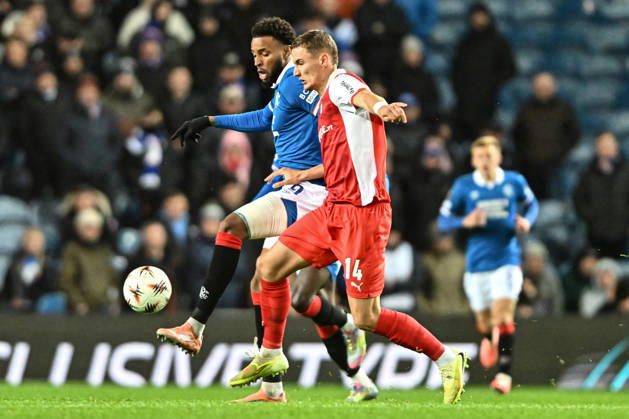 Rangers v S.C. Braga UEFA Europa League Youssef Chermiti of Rangers and Gustaf Lagerbielke of S.C. Braga during the UEFA Europa League match at Ibrox Stadium, Glasgow UK Newspapers OUT Copyright: xJamiexJohnstonx FIL-22559-0072