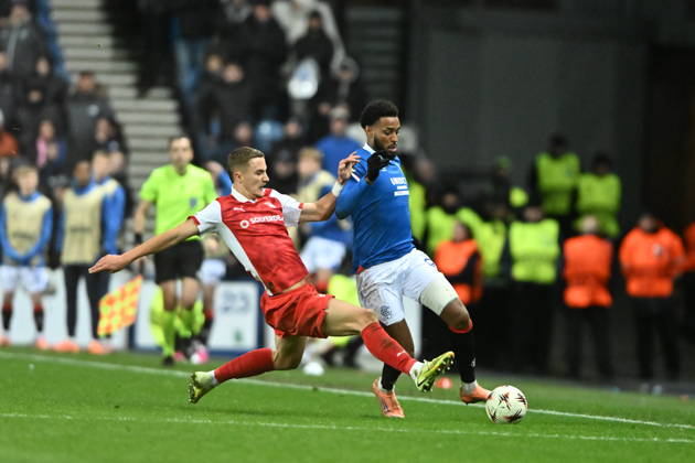 Rangers v S.C. Braga UEFA Europa League Youssef Chermiti of Rangers is tackled by Gustaf Lagerbielke of S.C. Braga during the UEFA Europa League match at Ibrox Stadium, Glasgow UK Newspapers OUT Copyright: xJamiexJohnstonx FIL-22559-0208