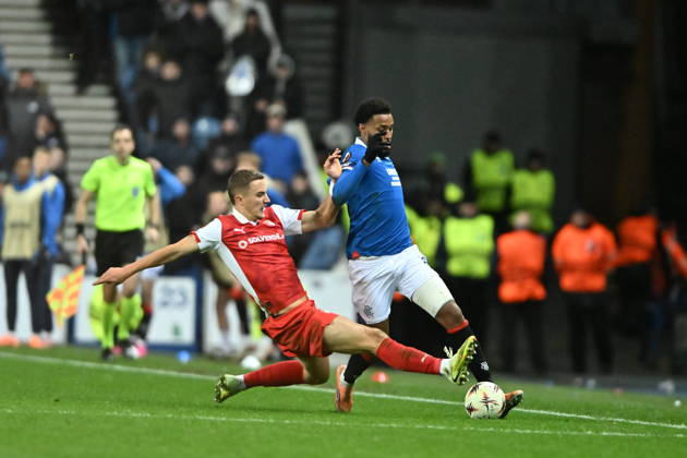 Rangers v S.C. Braga UEFA Europa League Youssef Chermiti of Rangers is tackled by Gustaf Lagerbielke of S.C. Braga during the UEFA Europa League match at Ibrox Stadium, Glasgow UK Newspapers OUT Copyright: xJamiexJohnstonx FIL-22559-0209