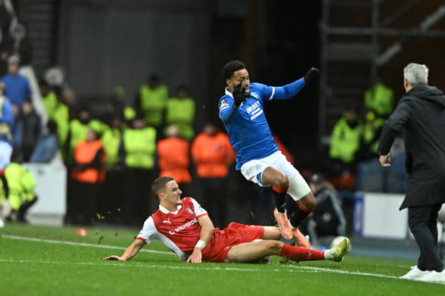 Rangers v S.C. Braga UEFA Europa League Youssef Chermiti of Rangers is tackled by Gustaf Lagerbielke of S.C. Braga during the UEFA Europa League match at Ibrox Stadium, Glasgow UK Newspapers OUT Copyright: xJamiexJohnstonx FIL-22559-0213