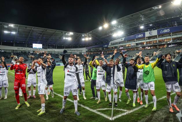 STVV s players celebrate after winning a soccer match between KAA Gent and STVV, Sunday 30 November 2025 in Gent, on day 16 of the 2025-2026 Jupiler Pro League first division of the Belgian championship. BRUNOxFAHY x145453643x