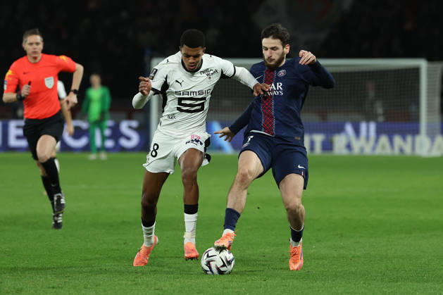 FBL-FRA-LIGUE1-Paris Saint Germain - Stade Rennes Abdelhamid Ait Boudlal(Stade Rennes), Khvicha Kvaratskhelia (Paris Saint-Germain)mbattle for the ball during the French L1 football match between Paris Saint-Germain (PSG) an Stade Rennes at Parc des Princes Paris ,France, on December 06, 2025. Copyright: JoaquimxFerreira