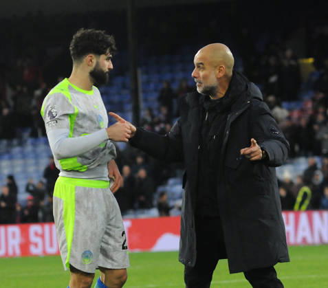Football - 2025 2026 Premier League - Crystal Palace vs Manchester City - Selhurst Park- Sunday 14th December 2025 Manchester City Manager, Pep Guardiola talks to Ruben Dias after the match
