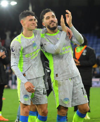 Football - 2025 2026 Premier League - Crystal Palace vs Manchester City - Selhurst Park- Sunday 14th December 2025 Phil Foden and Rayan Cherki of Manchester City celebrate with their fans after the match