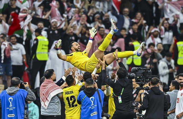 (251216) -- AL KHOR, Dec. 16, 2025 -- Jordan s team members celebrate with goalkeeper Yazeed Abulaila (top) the FIFA Arab Cup 2025 Semi-final match between Saudi Arabia and Jordan at Al Bayt Stadium in Al Khor, Qatar, on Dec. 15, 2025. (Photo by Xinhua) (SP)QATAR-AL KHOR-FIFA ARAB CUP-SEMI-FINAL-SAUDI ARABIA VS JORDAN Nikku 