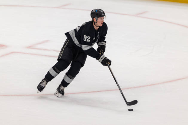 December 13, 2025, Los Angeles, California, United States: LOS ANGELES, CALIFORNIA - DECEMBER 13: Defenseman Brandt Clarke 92 of the Los Angeles Kings skates with the puck during a game between the Calgary Flames and Los Angeles Kings at Crypto.com Arena on December 13, 2025, in Los Angeles, California. Calgary Flames V Los Angeles Kings - ZUMAt139 20251213_aaa_t139_010 Copyright: xJordanxTeller IsixPhotosx